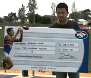 Adrian with cheque