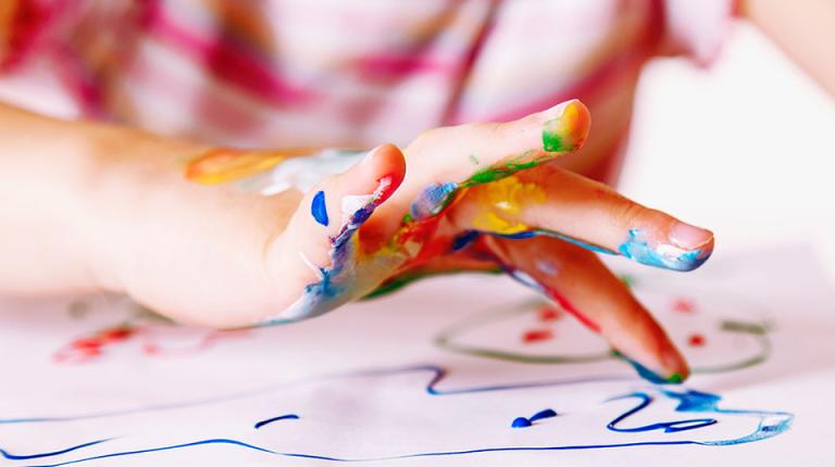  Child fingerpainting.